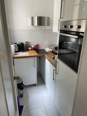 Cuisine ou kitchenette dans l'établissement Appart à deux pas de paris expo