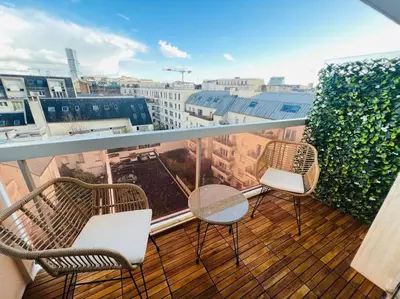 Balcon ou terrasse dans l'établissement Appartement Panorama - à seulement 15 minutes des Champs-Élysées