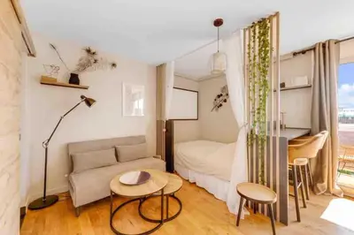 Coin salon dans l'établissement Appartement Panorama - à seulement 15 minutes des Champs-Élysées