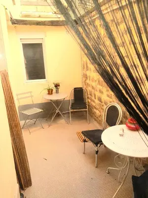 Coin salon dans l'établissement Au pied du Sacré Cœur