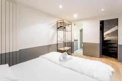Un ou plusieurs lits dans un hébergement de l'établissement SLEEPOO - Fabulous 8