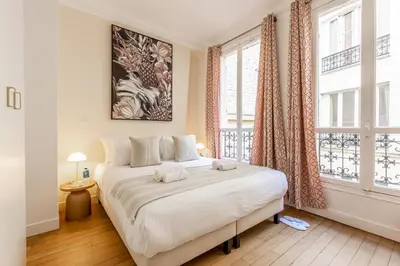Un ou plusieurs lits dans un hébergement de l'établissement Sweett - Maison Wagram