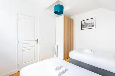 Un ou plusieurs lits dans un hébergement de l'établissement GuestReady - Fantastic stay near Musée du Louvre