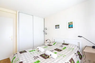 Un ou plusieurs lits dans un hébergement de l'établissement GuestReady - White getaway near Jardin des Plantes