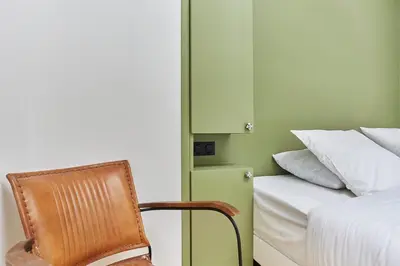 Un ou plusieurs lits dans un hébergement de l'établissement Apartment Loft Père Lachaise by Studio prestige