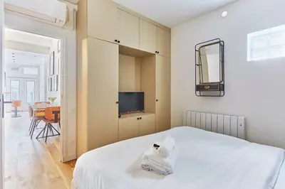 Un ou plusieurs lits dans un hébergement de l'établissement Apartment Loft Père Lachaise by Studio prestige