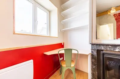 Cuisine ou kitchenette dans l'établissement Lovely apartment Paris Saint-Lazare Opéra