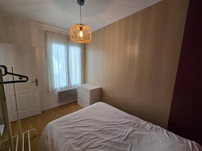 Un ou plusieurs lits dans un hébergement de l'établissement Appartement spacieux 28m2 avec chambre séparée