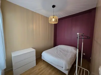 Un ou plusieurs lits dans un hébergement de l'établissement Appartement spacieux 28m2 avec chambre séparée