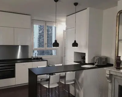 Cuisine ou kitchenette dans l'établissement Air conditioning Paris central stylish apartment