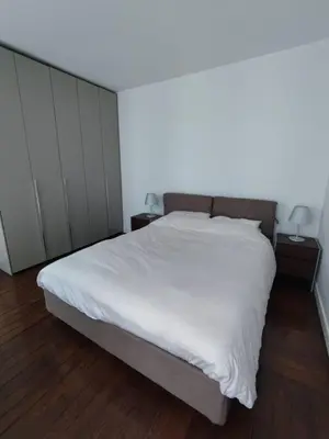 Un ou plusieurs lits dans un hébergement de l'établissement Air conditioning Paris central stylish apartment
