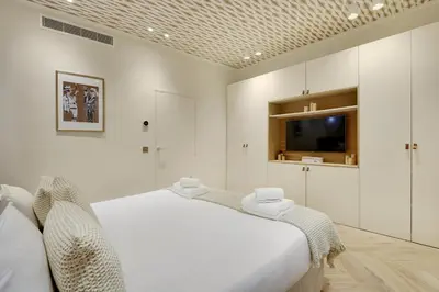 Un ou plusieurs lits dans un hébergement de l'établissement Pick A Flat's Apartment in Saint Germain des Près - Rue du Cherche Midi