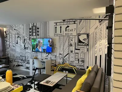 Télévision ou salle de divertissement dans l'établissement Appartement Flandre