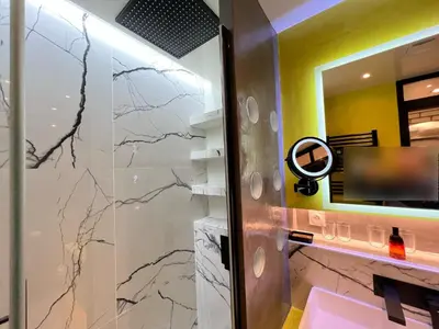 Salle de bains dans l'établissement Appartement Flandre