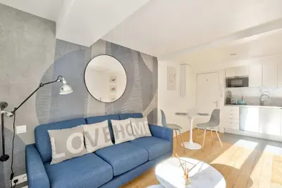 Coin salon dans l'établissement Bel appartement au coeur de Montorgueil