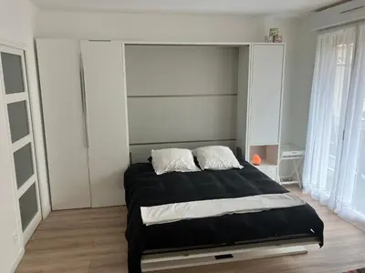 Un ou plusieurs lits dans un hébergement de l'établissement Paris 42m Studio plus terrace