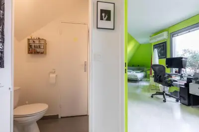 Télévision ou salle de divertissement dans l'établissement GuestReady- 2 Terrace Duplex with Exceptional View