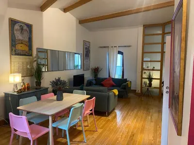Coin salon dans l'établissement Superbe et accuiellent appartement