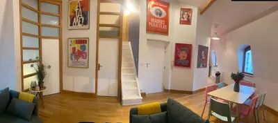 Coin salon dans l'établissement Superbe et accuiellent appartement