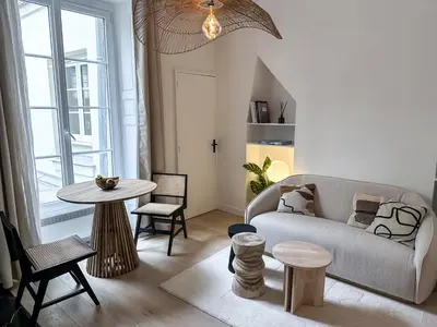 Coin salon dans l'établissement Canettes Deluxe Apartment