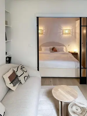 Un ou plusieurs lits dans un hébergement de l'établissement Canettes Deluxe Apartment