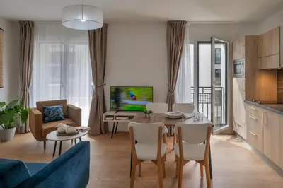 Télévision ou salle de divertissement dans l'établissement Domitys Le 225