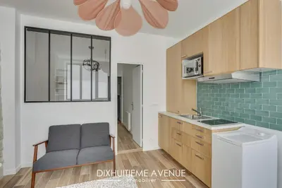Cuisine ou kitchenette dans l'établissement Cœur du 18eme