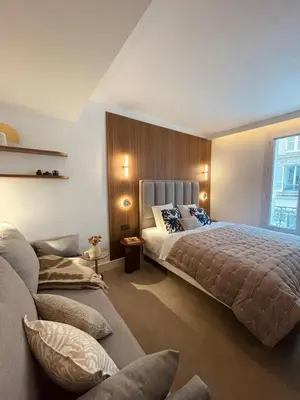 Un ou plusieurs lits dans un hébergement de l'établissement CARD Hôtel