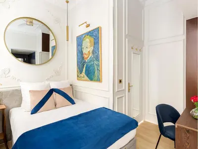 Un ou plusieurs lits dans un hébergement de l'établissement Merveil - Luxury Suite - Louvre - Marcel III