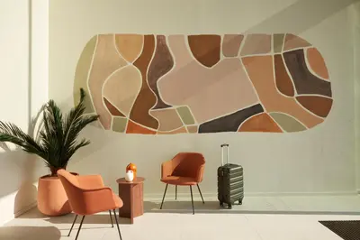 Coin salon dans l'établissement OKKO Hotels Paris Rosa Parks