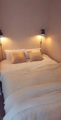 Un ou plusieurs lits dans un hébergement de l'établissement Studio Cosy Paris centre alesia