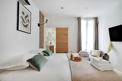 Un ou plusieurs lits dans un hébergement de l'établissement Welcoming apartment - 1BR-4P - Sacré-Cœur