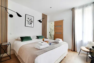 Un ou plusieurs lits dans un hébergement de l'établissement Welcoming apartment - 1BR-4P - Sacré-Cœur