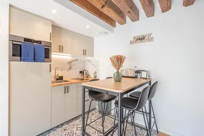 Cuisine ou kitchenette dans l'établissement Le Petit Rex