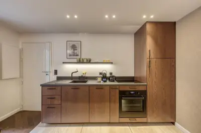 Cuisine ou kitchenette dans l'établissement Le Nid du Marais I 3CH I 2SDB I AC