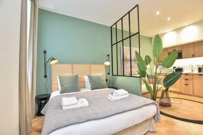 Un ou plusieurs lits dans un hébergement de l'établissement Cosy apartment - 1BR-3P - Rue du Bac