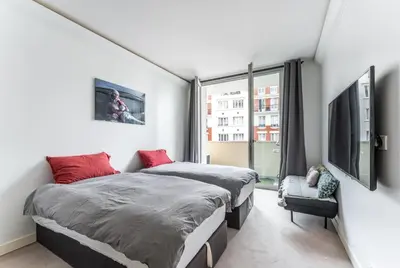 Un ou plusieurs lits dans un hébergement de l'établissement Paris 16 - Appartement entier - Chez Penny