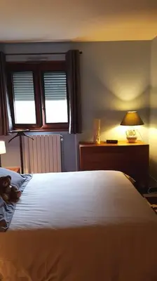Un ou plusieurs lits dans un hébergement de l'établissement Appartement tout équipé pour 4per parking privatif