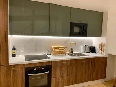 Cuisine ou kitchenette dans l'établissement Charming loft style appartment in center of marais