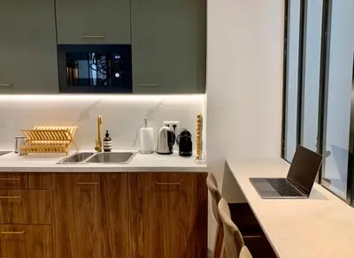 Cuisine ou kitchenette dans l'établissement Charming loft style appartment in center of marais