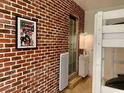 Cuisine ou kitchenette dans l'établissement Charming loft style appartment in center of marais