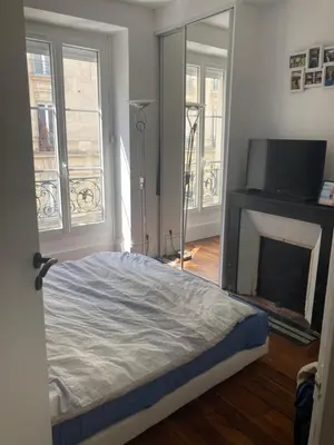 Un ou plusieurs lits dans un hébergement de l'établissement Appartement 3 pièces Paris 11e