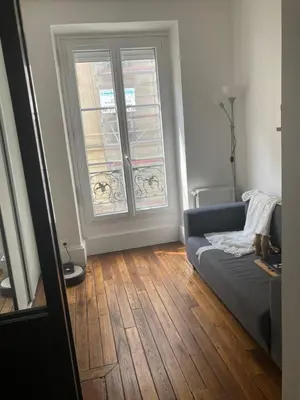 Coin salon dans l'établissement Appartement 3 pièces Paris 11e